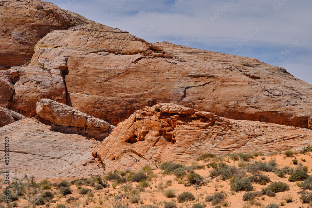 Pink and yellow rock formations formed in the Nevada desert