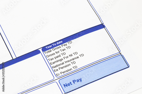Wage pay slip showing pension, national insurance and tax earnings deductions.  Isolated on a white background