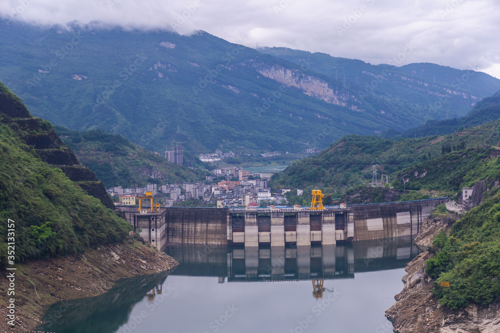 Dam wall and surrounding landscape at Wulong Dam in Chongqing, China.