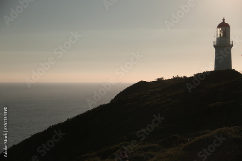 Sea horizon with light house on top of the hill © Bacardy