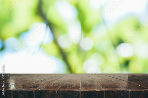 wooden table with bokeh background