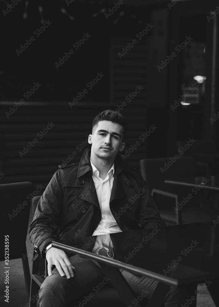 custom made wallpaper toronto digital stylish handsome young man sitting in cafe