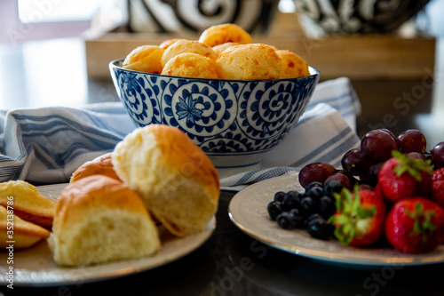 Cheese Bread served in a restaurant. 

Brazilian snack cheese bread - Traditional Brazilian food.