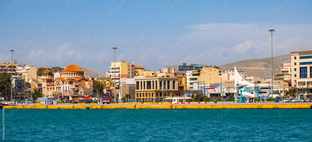 Panoramic view of Piraeus port city historic old town quarter at the Saronic Gulf of Aegean sea in broad metropolitan Athens area in Greece