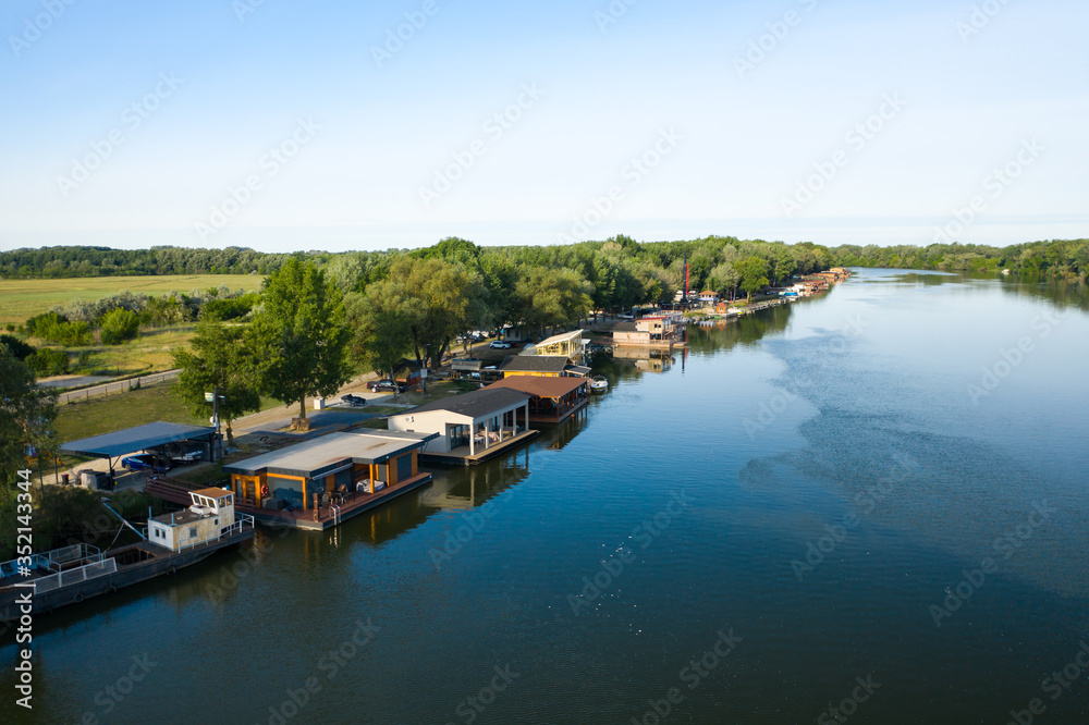 Floating houses on Tisza river in Tiszafured, Hungary.
