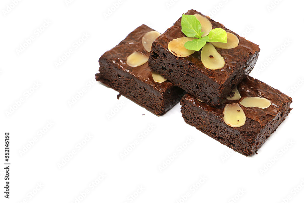 Group of Chocolate brownie with almond on white background, copy space Group of Chocolate brownie with almond on white background, copy space