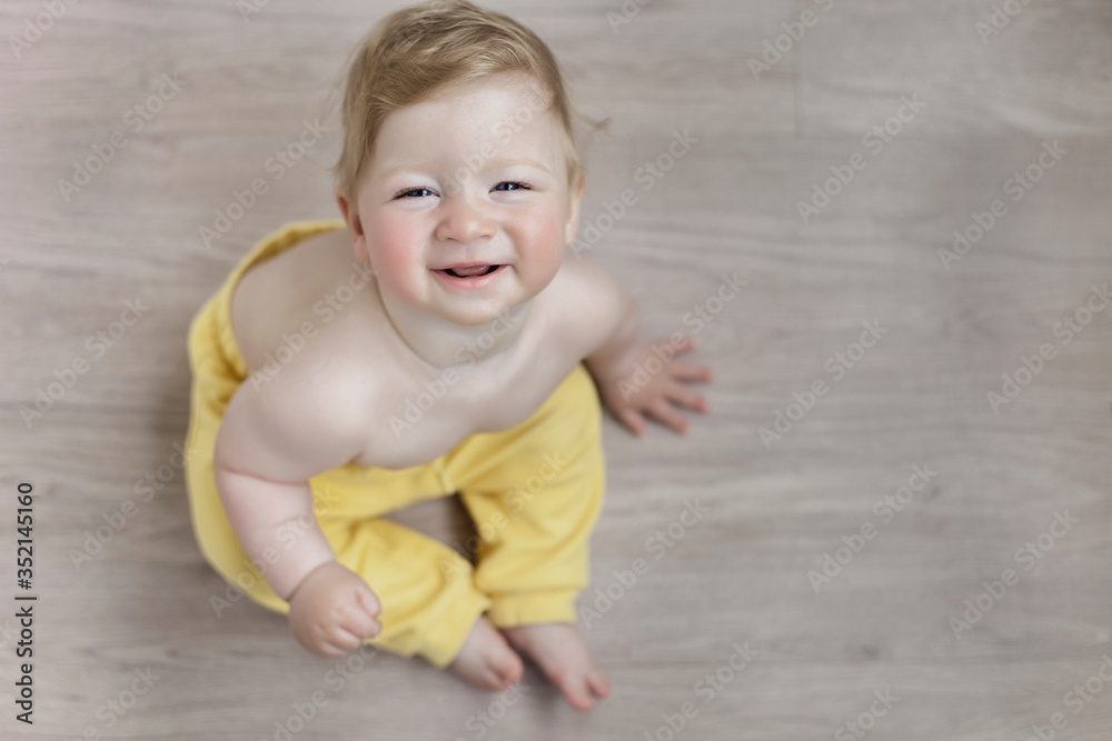beautiful baby in the room is playing with mom, a red-cheeked child. beautiful baby in the room is playing with mom, a red-cheeked child.