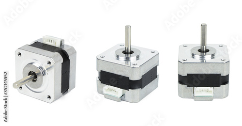 Various views of electrical stepping or stepper motor isolated on white background with clipping path. NEMA standard flange motor for driving axes of CNC machines.
