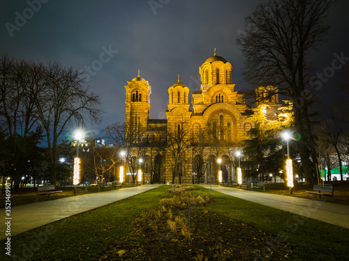 Exterior of the Saint Mark's Church (Crkva Svetog Marka), a Serbian Orthodox church located in the Tasmajdan park, built in 1940 in the Serbo-Byzantine style, at night. photo