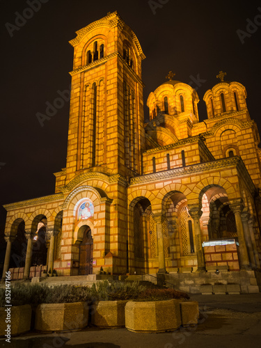 Exterior of the Saint Mark's Church (Crkva Svetog Marka), a Serbian Orthodox church located in the Tasmajdan park, built in 1940 in the Serbo-Byzantine style, at night. photo