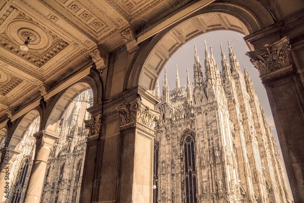 Duomo cathedral of Milan, Italy. Look from the arcade portico.