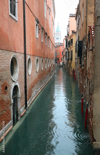 navigable canal with the houses of Venice photo