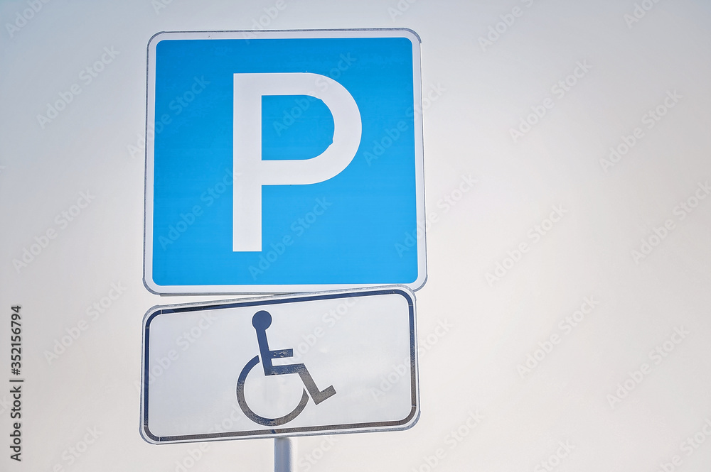 Car parking sign for people with disabilities. Car parking sign for people with disabilities.
