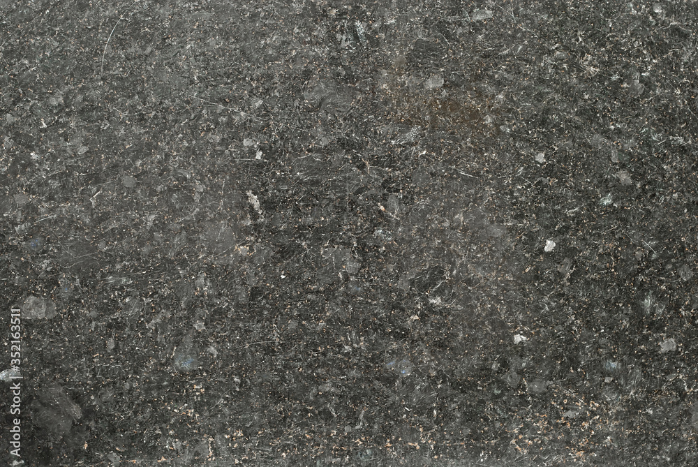 Black and white marble texture. Stone tile with natural pattern. Marble pavement closeup. A small marble crumb. Black and white marble texture. Stone tile with natural pattern. Marble pavement closeup. A small marble crumb.