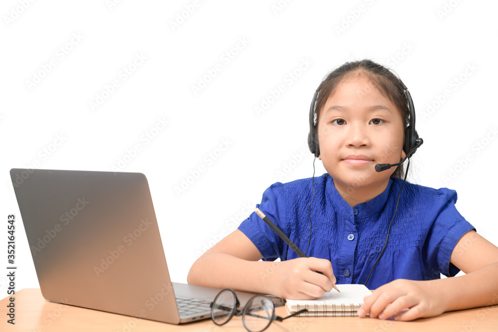 Asian girl student wear wireless headphone study online at home. Asian girl student wear wireless headphone study online at home.