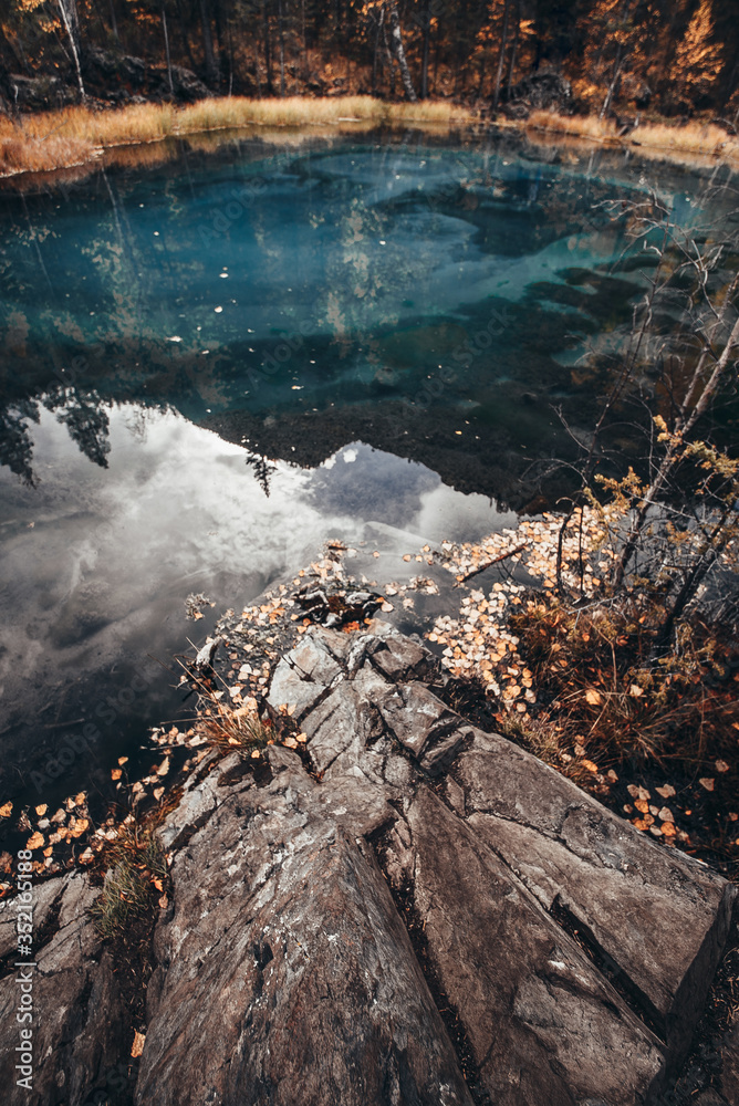 geyser lake in the Altai mountains, in autumn geyser lake in the Altai mountains, in autumn