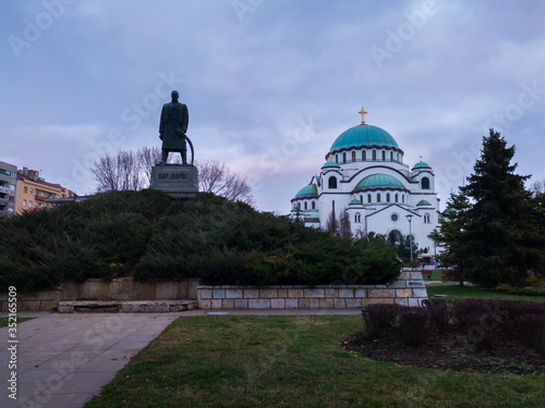 Karadjordje Monument and the Church of Saint Sava or Saint Sava Temple  (Hram Svetog Save) on the Vracar plateau in Belgrade, Serbia, at a overcast day. photo