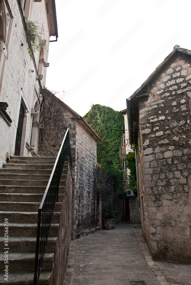 A narrow alley in the old town of sun-drenched
