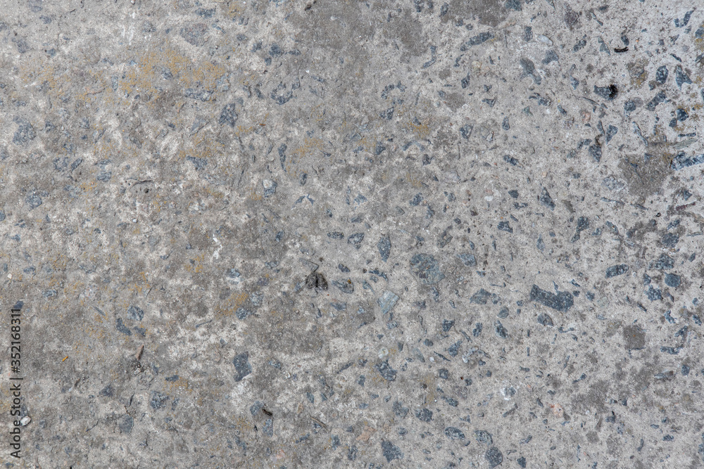 Close up view of the texture of concrete. Cement construction background for text Close up view of the texture of concrete. Cement construction background for text