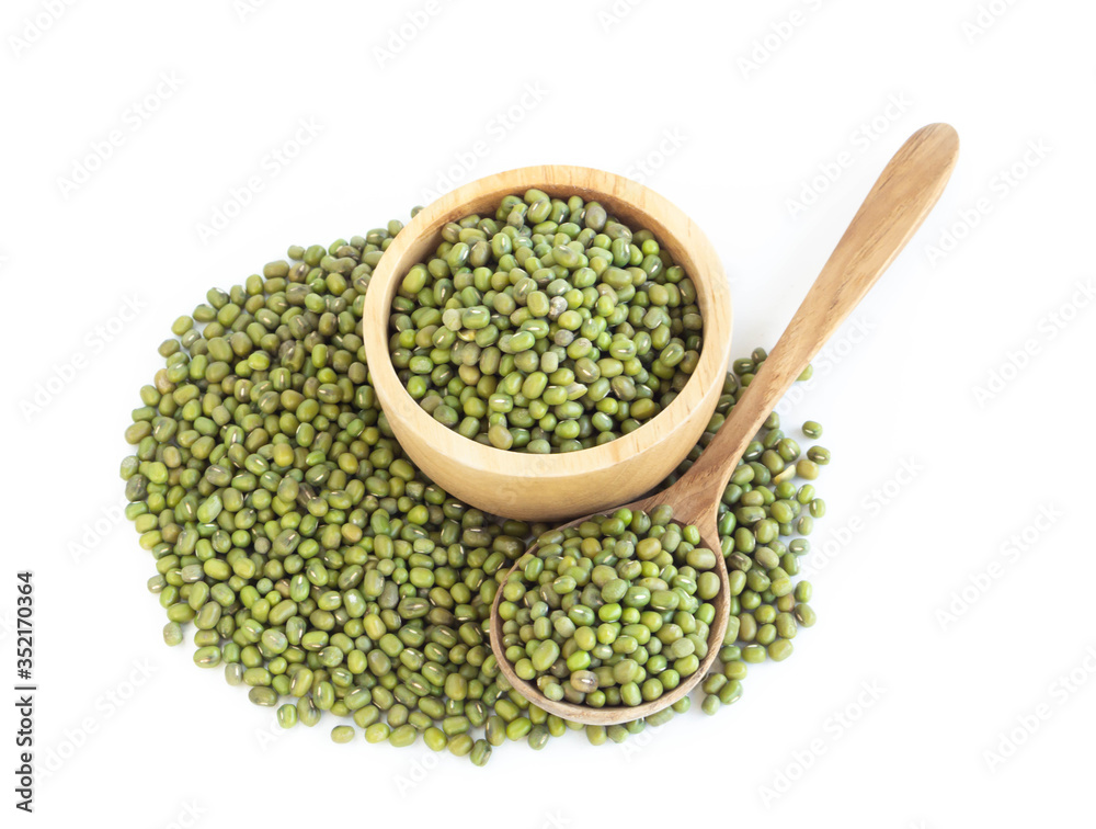 Closeup mung beans seeds in wooden bowl on white background, healthy food concept Closeup mung beans seeds in wooden bowl on white background, healthy food concept