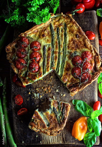 delicious home-made tart with asparagus and tomatoes