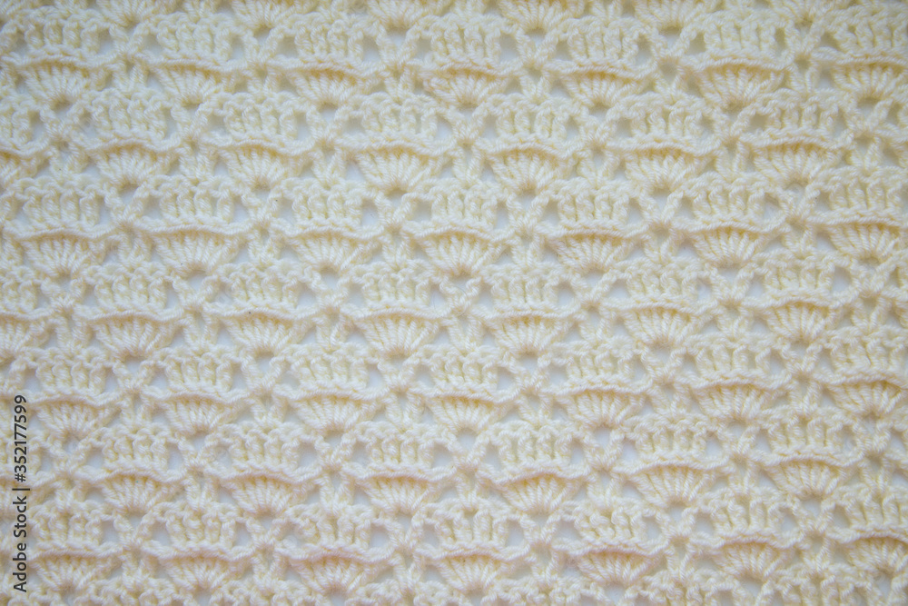 Light background with the texture of openwork canvas crocheted. Background for wedding albums and scrapbooking.