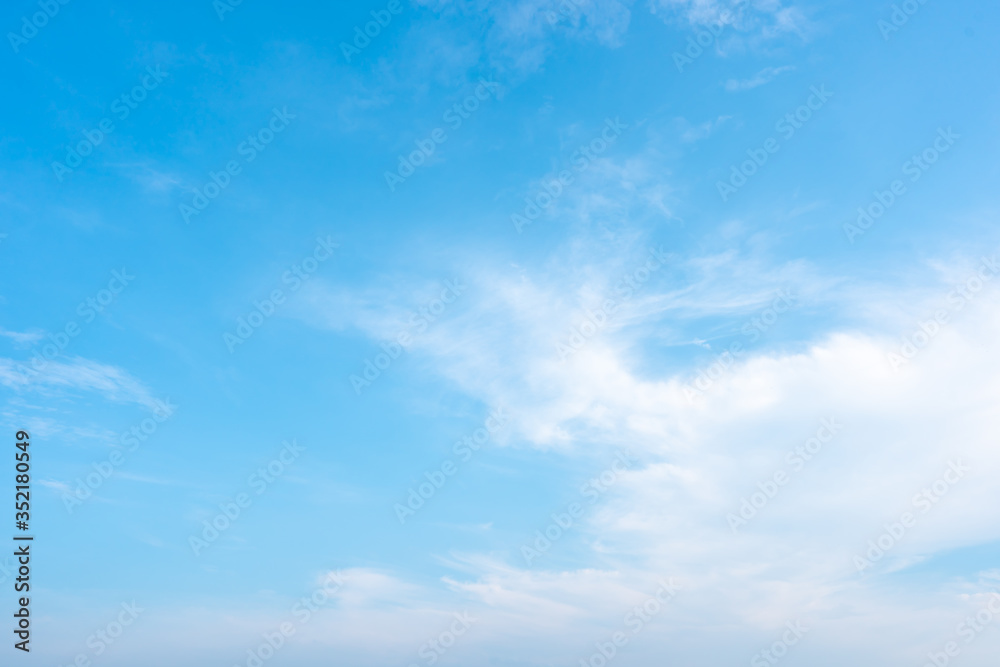 Blue sky and white clouds background on daytime