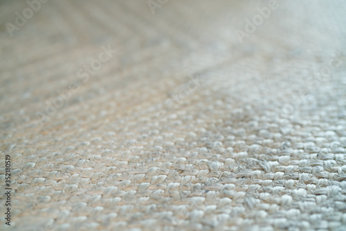 pale jute floor rag background closeup photo