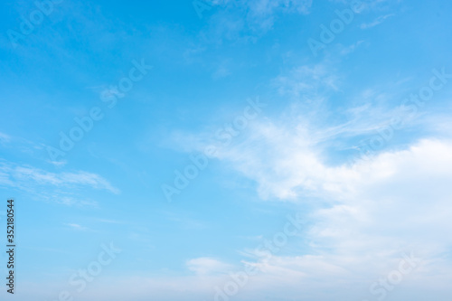 Blue sky and white clouds background on daytime