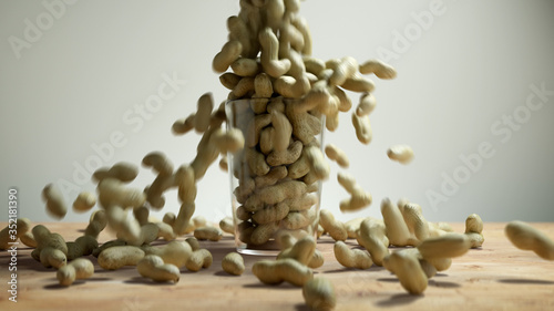 Cup overfilled with peanuts on Wooden table. Nuts Overfill Glass Mug