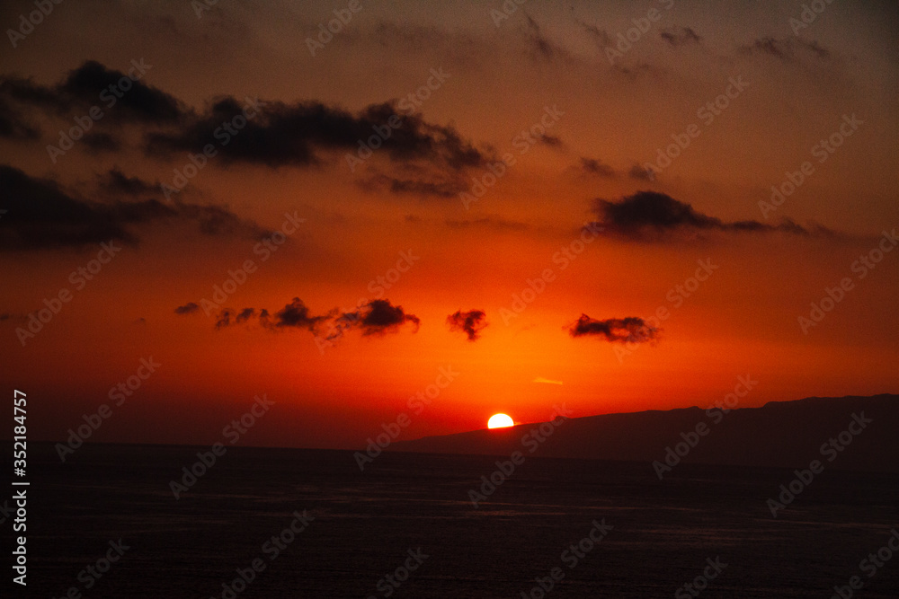 The sun setting over the Atlantic ocean from the island of tenerife The sun setting over the Atlantic ocean from the island of tenerife