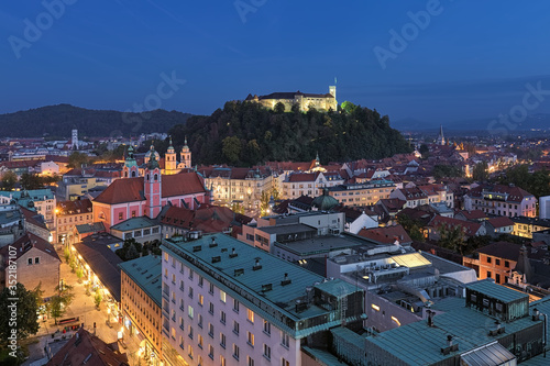 Obraz na płótnie Ljubljana, Slovenia. High angle view on the historical part of the city in dusk. View from observation desk at the top floor of the Neboticnik building (The Skyscraper). w salonie