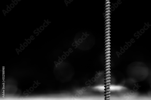 Screw diving - spiral slides of a wood screw © Snapchitra