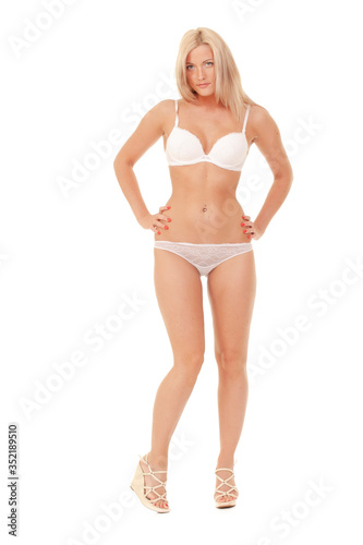 Sexy woman in white lingerie gorgeous figure.