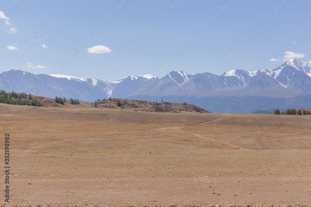 View of Belukha Mountain. Russia. Snow mountains of Altai. Belukha the highest peak of Siberia