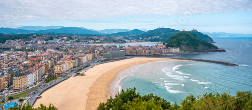 General view of the zurriola beach in the city of San Sebastian one spring morning photo