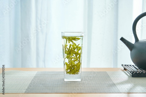 A fresh cup of Chinese tea on the office desk