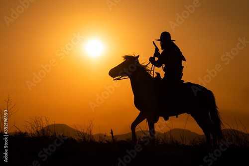 silhouette of cowboy 