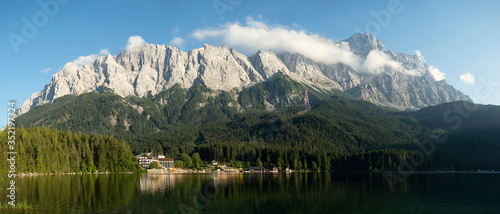 Fototapeta Naklejka Na Ścianę i Meble -  View of Zugspitze Mountains seen from bank of Lake Eibsee