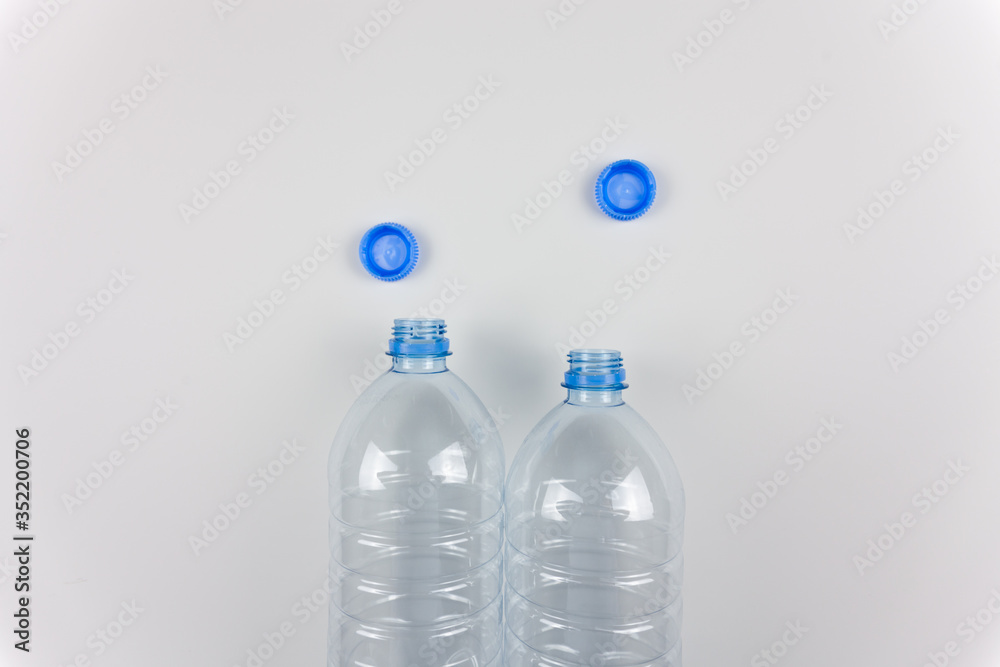 Things made of plastic. Plastic bottles for liquid. For the presentation of products that need to be poured into bottles. Recycling.