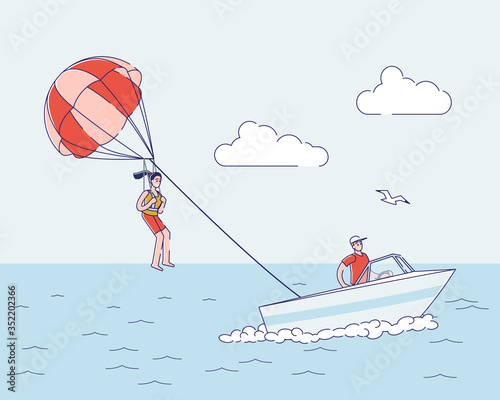 Girl parasailing with parachute in sky over water boat. Extreme summer water activity concept