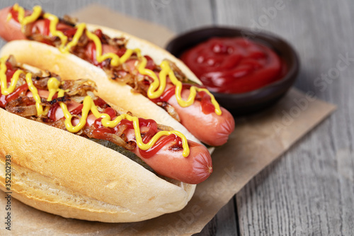 Barbecue Grilled Hot Dog with Yellow Mustard and ketchup