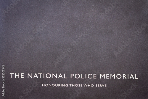 London, UK - May 14 2020: The stone inscription on the National Police Memorial: Honouring Those Who Serve