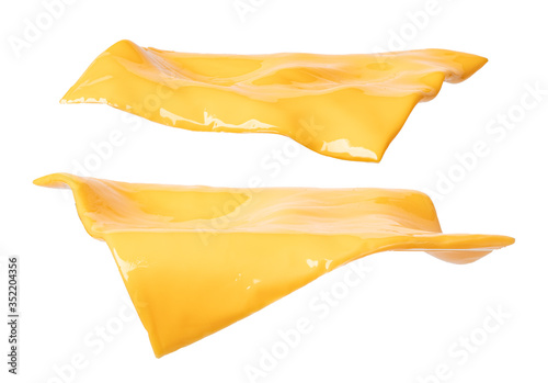 pieces of cheddar cheese on a white background photo