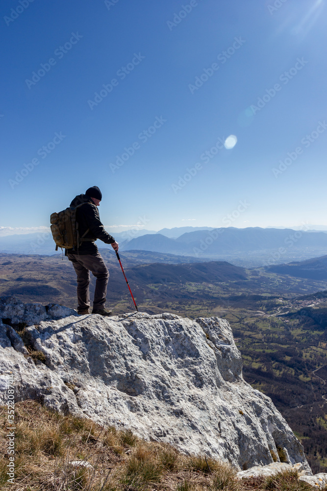 hiker on the top of a mountain