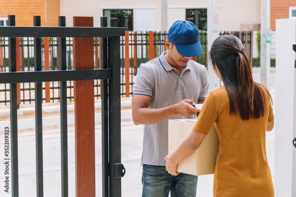 Fast service commerce delivery concept. Deliveryman sent parcel package box for customer, Received parcel box from shopping online Fast service commerce delivery concept. Deliveryman sent parcel package box for customer, Received parcel box from shopping online