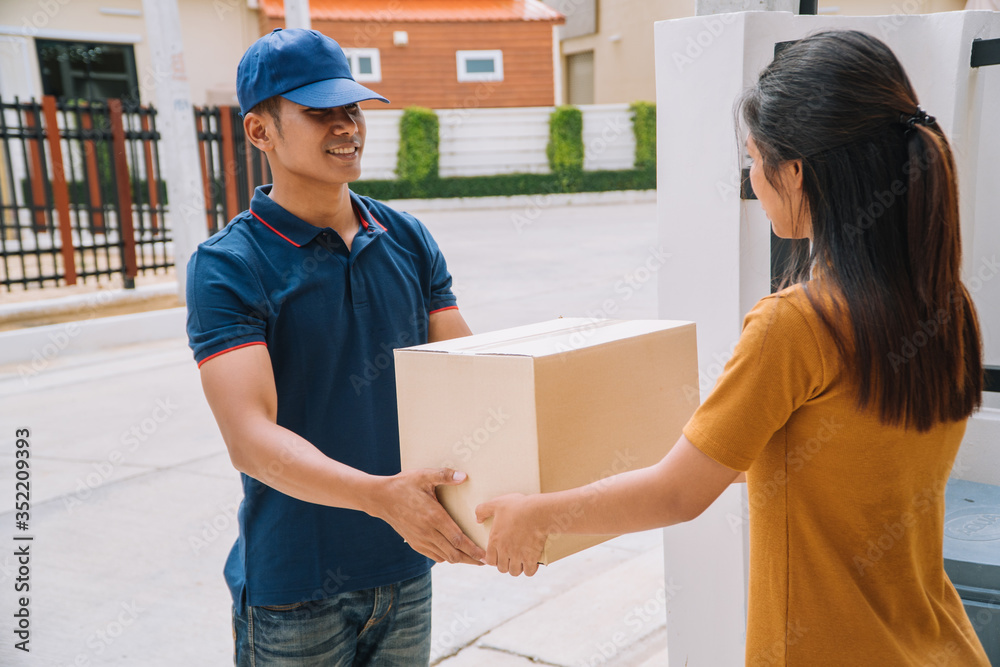 custom made wallpaper toronto digitalFast service commerce delivery concept. Deliveryman sent parcel package box for customer, Received parcel box from shopping online