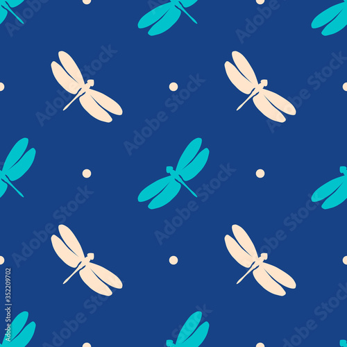 Seamless pattern with colorful dragonflies. Blue and white elements on a dark blue background. Stock vector illustration. Creative idea for modern designs backdrops, cards, textiles, packings, fabric.