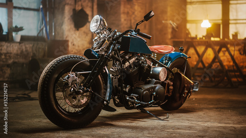 Fotografia, Obraz Custom Bobber Motorbike Standing in an Authentic Creative Workshop