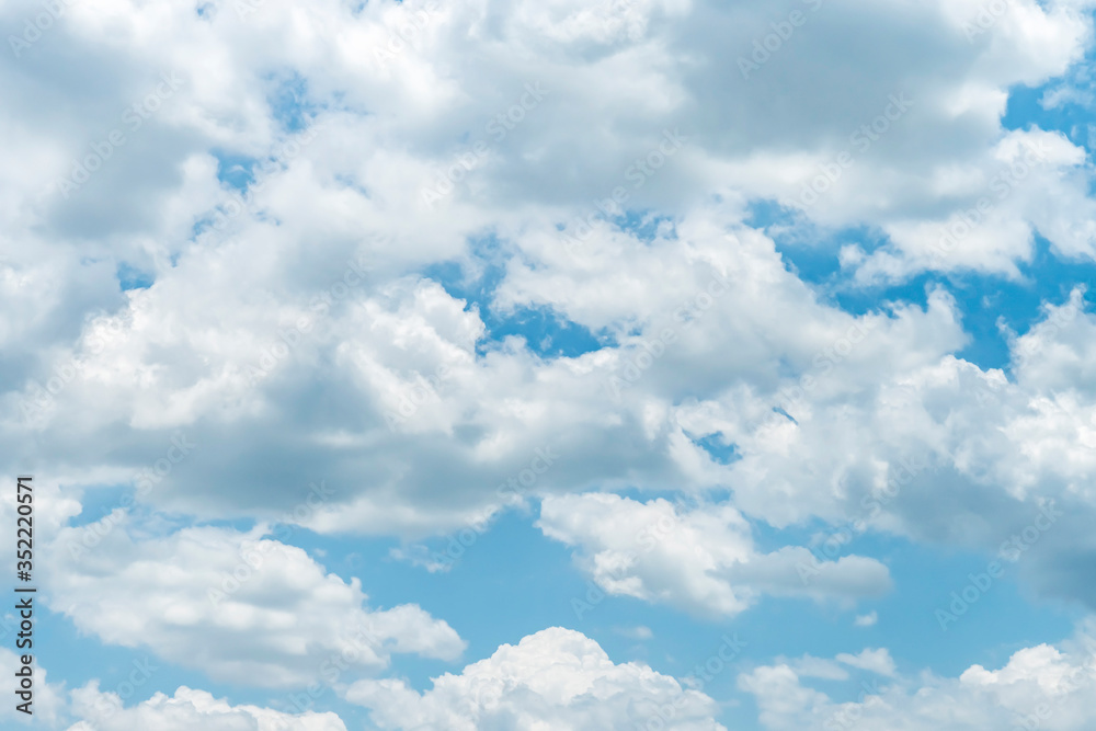 Obraz premium Blue sky background with clouds.